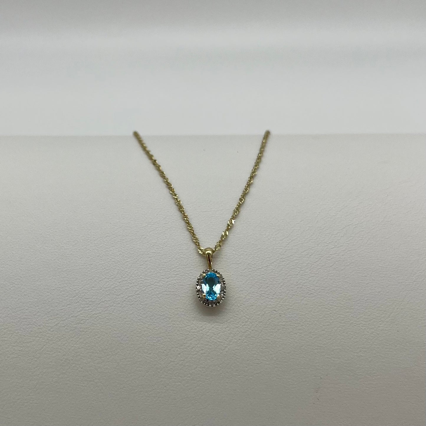 Antique Blue Topaz & Diamond Halo Necklace, 0.6 CTW 10K Gold