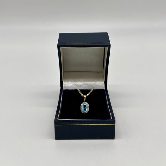 Antique Blue Topaz & Diamond Halo Pendant, 0.6 CTW 10K Gold