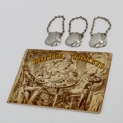 Trio of Sterling Silver Bottle Tags & Antique Book