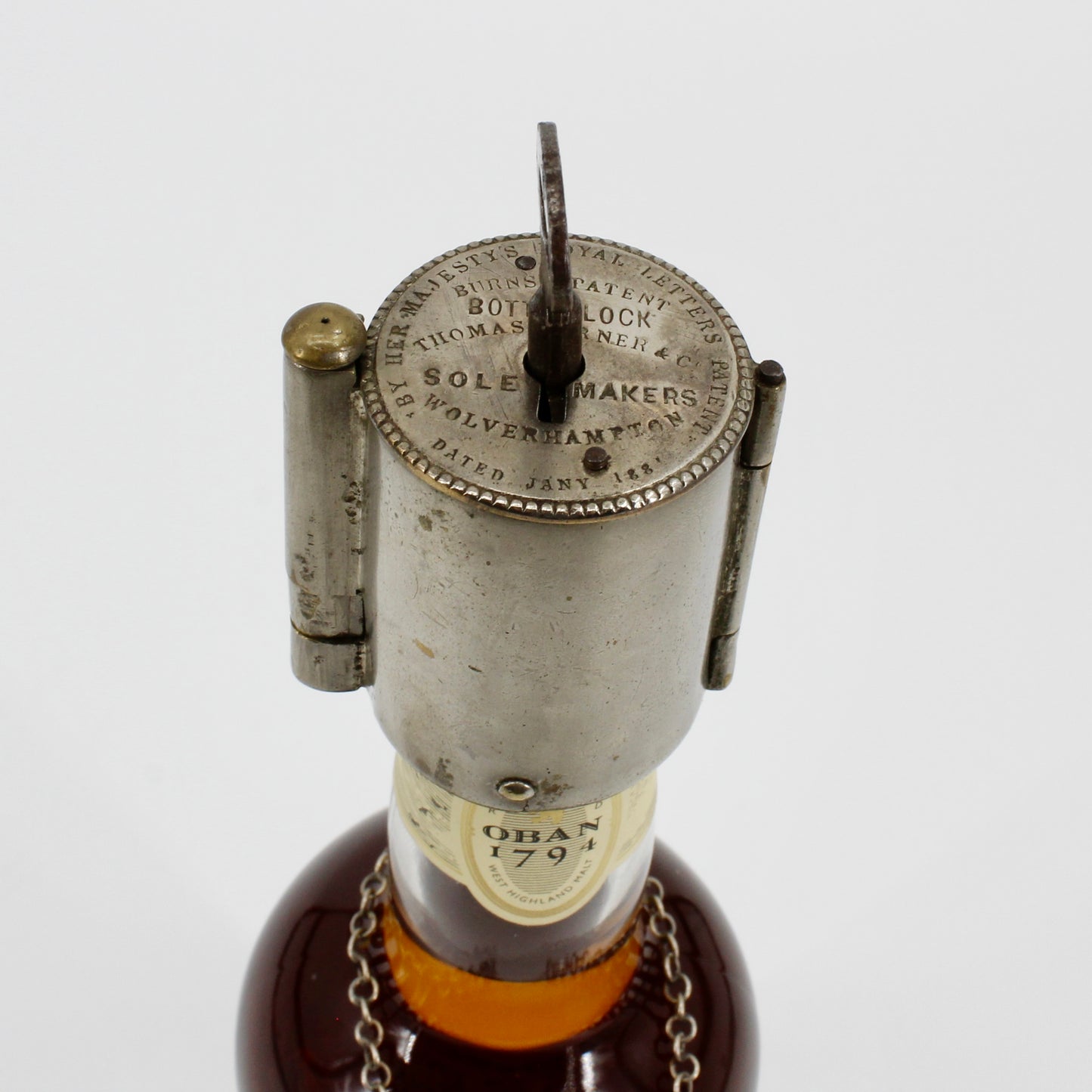 1881 Burns's Royal Patent Bottle Lock & Key Set by Thomas Turner & Co.