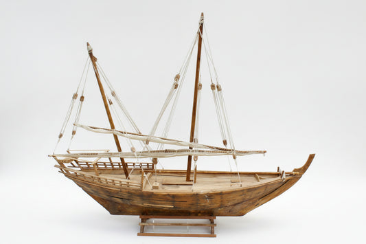 Model ship on a white background