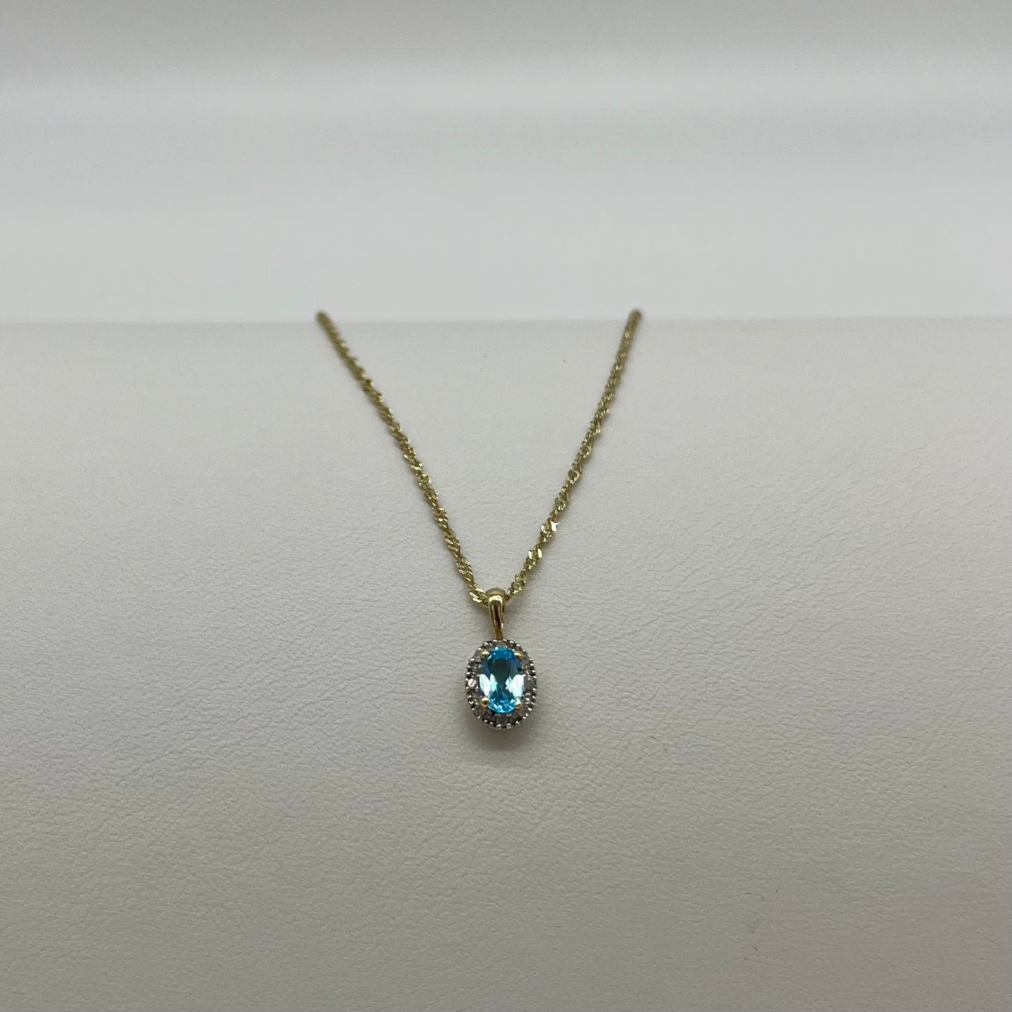 Antique Blue Topaz & Diamond Halo Necklace, 0.6 CTW 10K Gold