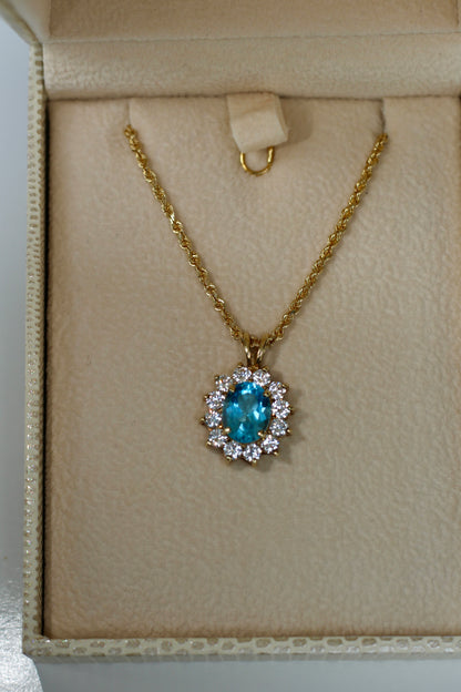 Blue Topaz & Cubic Zirconia Halo Pendant, 3.63 Carats 10K Gold