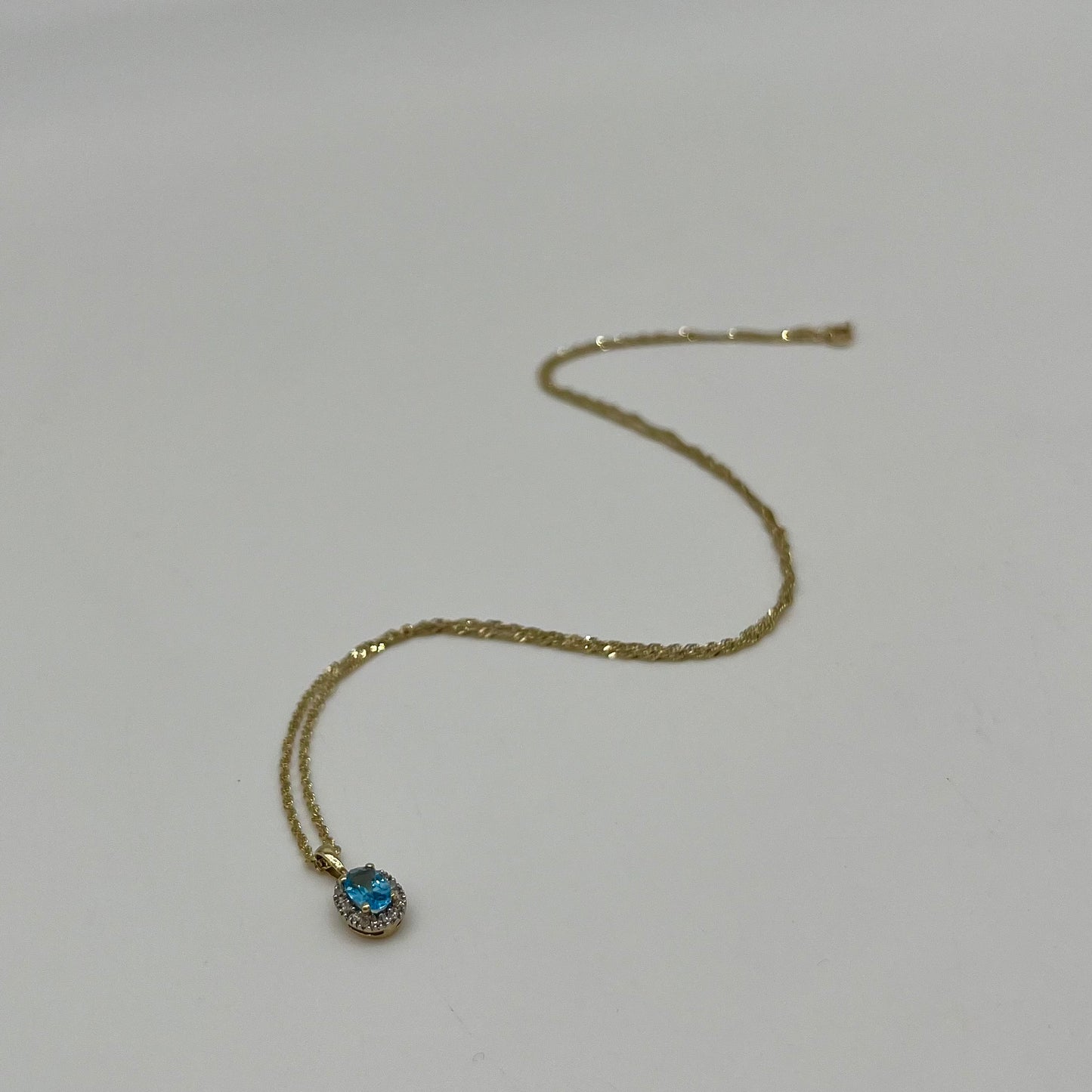 Antique Blue Topaz & Diamond Halo Necklace, 0.6 CTW 10K Gold