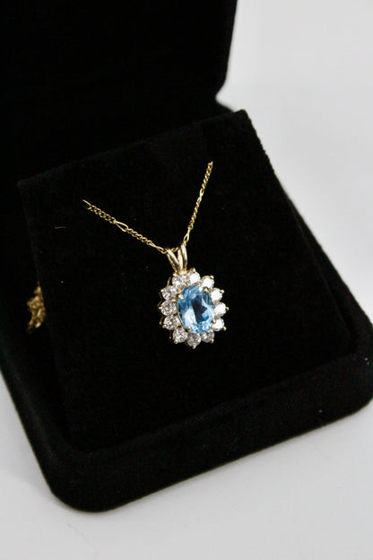 Blue Topaz & Cubic Zirconia Halo Pendant, 3.63 Carats 10K Gold