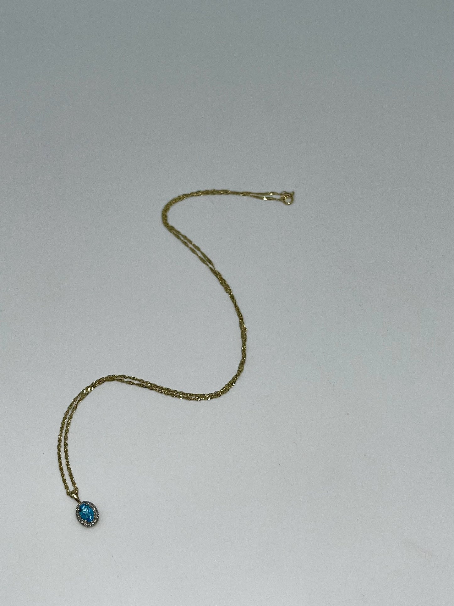 Antique Blue Topaz & Diamond Halo Necklace, 0.6 CTW 10K Gold