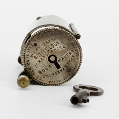 1881 Burns's Royal Patent Bottle Lock & Key Set by Thomas Turner & Co.