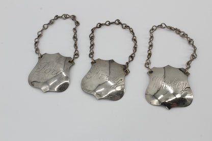 Trio of Sterling Silver Bottle Tags & Antique Book