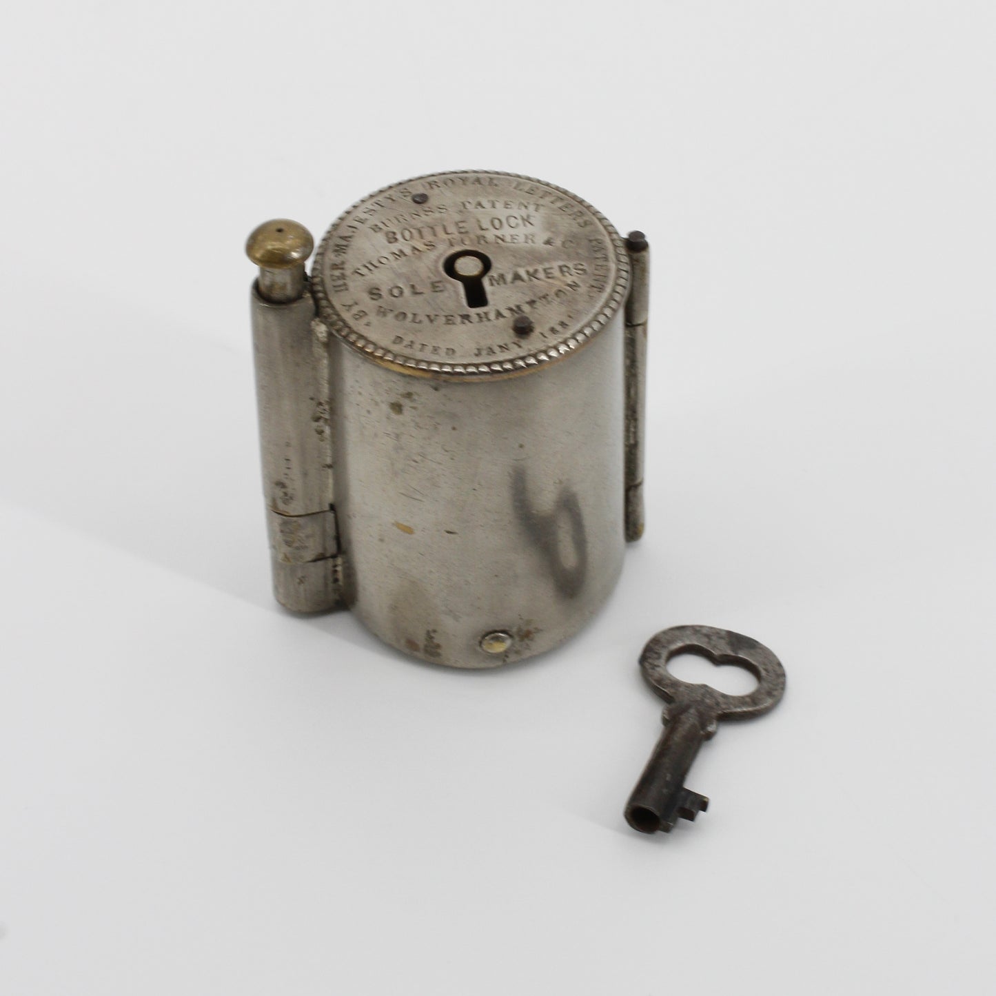 1881 Burns's Royal Patent Bottle Lock & Key Set by Thomas Turner & Co.