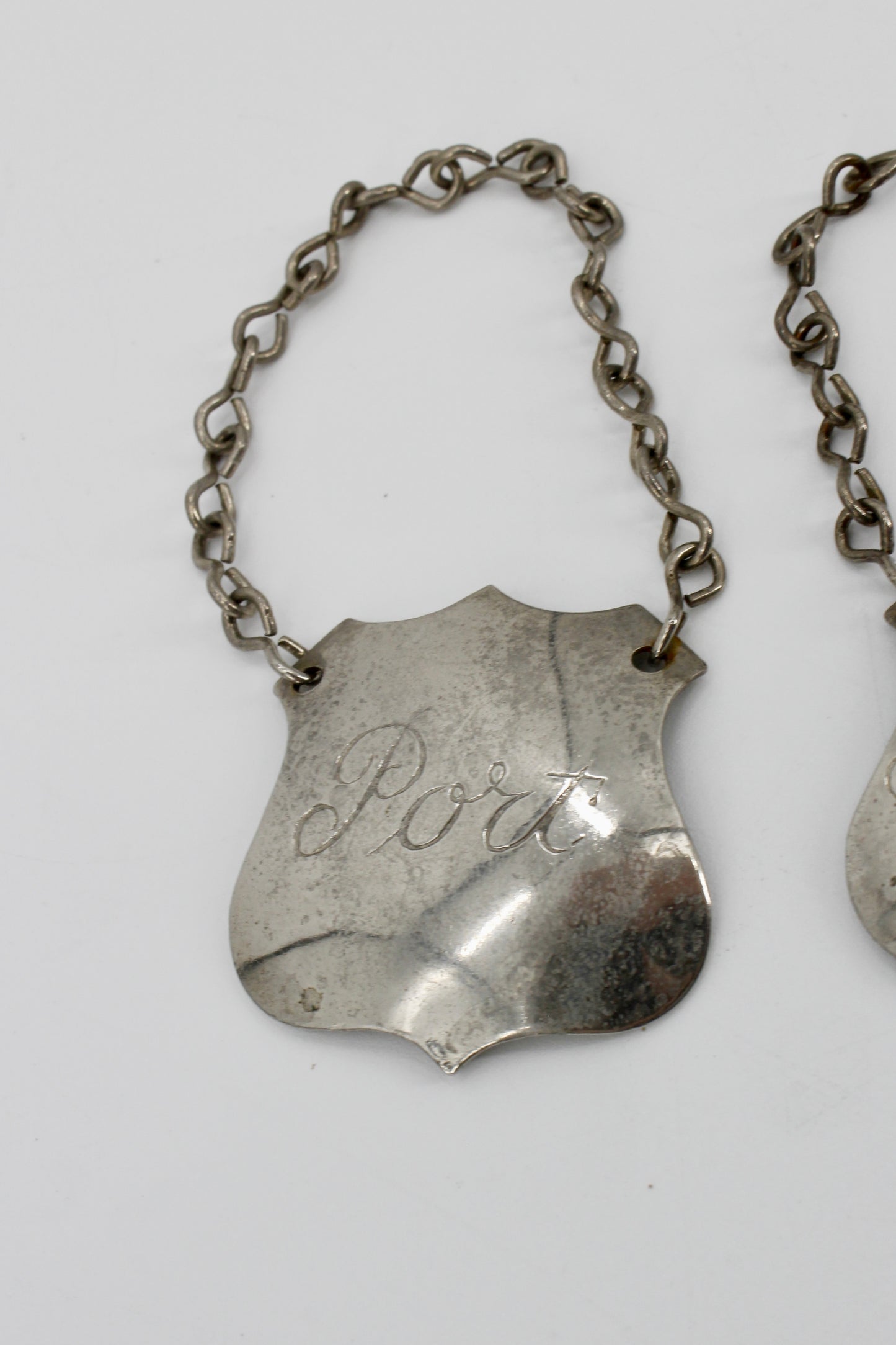 Trio of Sterling Silver Bottle Tags & Antique Book