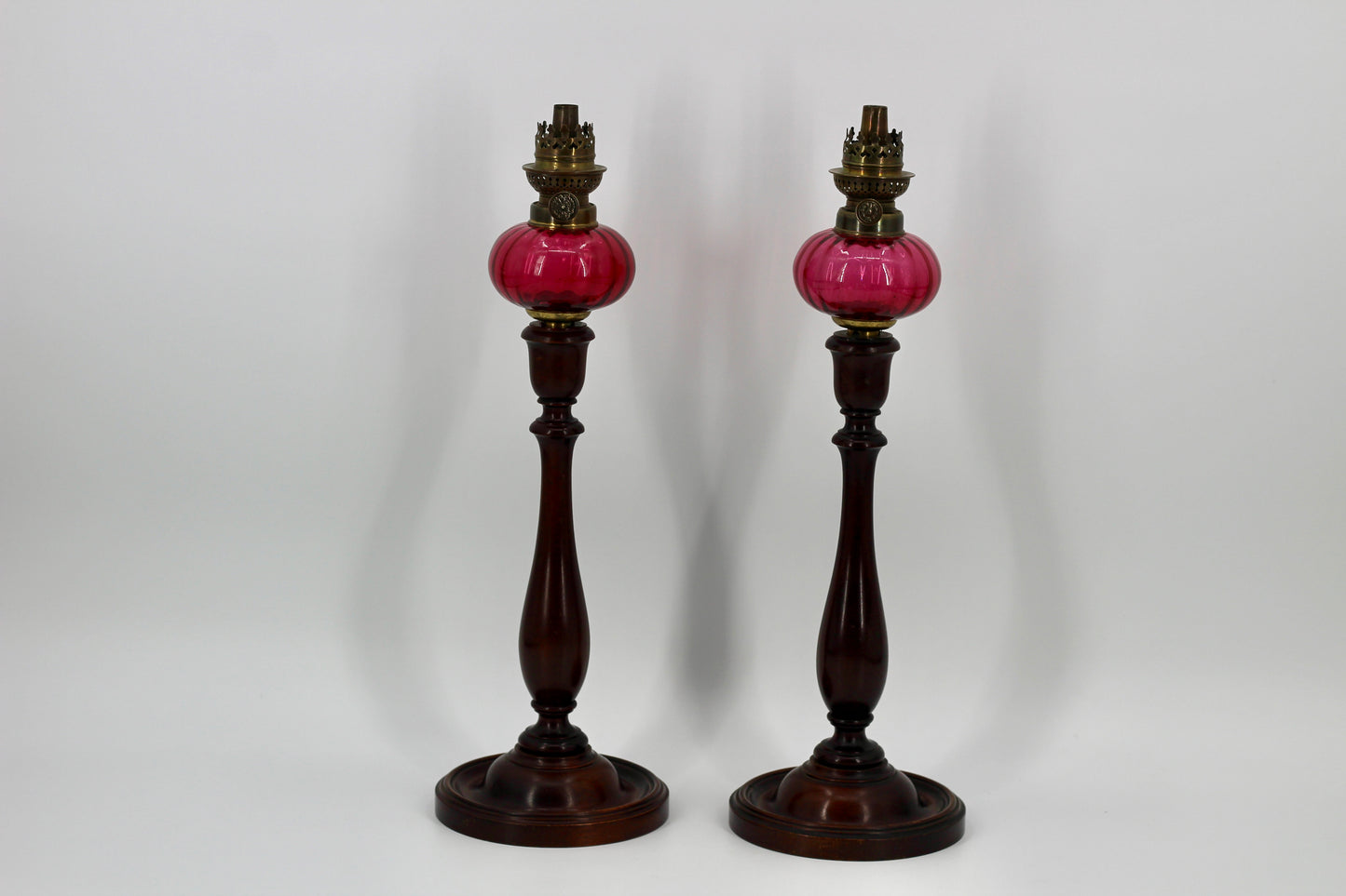 Imperial Russian Red-Font Mahogany Peg Lamp Pair