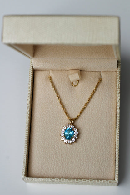 Blue Topaz & Cubic Zirconia Halo Pendant, 3.63 Carats 10K Gold